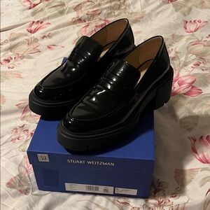 Stuart Weitzman Glossy Black Loafers